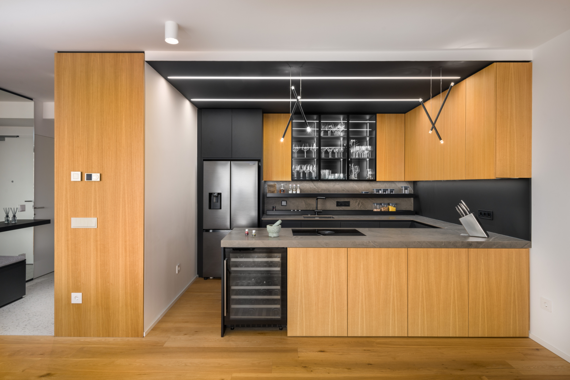 Kitchen renovation with wooden cabinets in a modern apartment