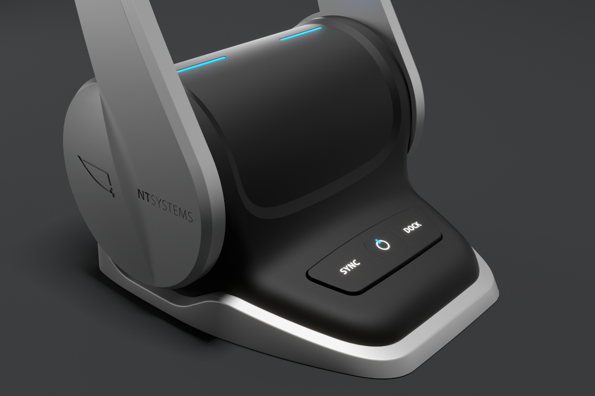 Black and gray NT Systems joystick control panel, with illuminated buttons