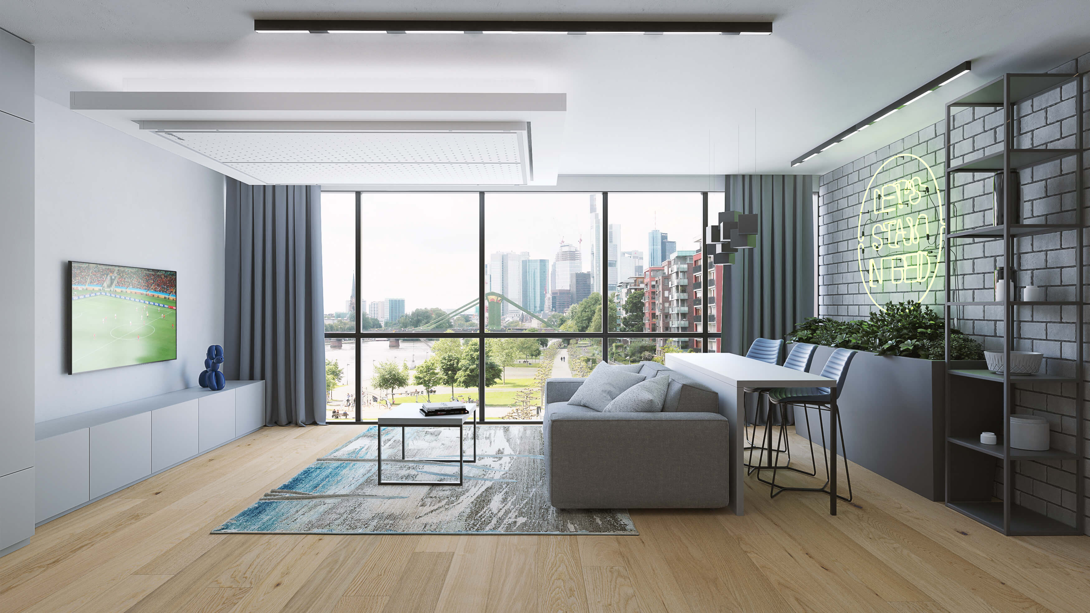 Dnevna soba z zaprto visečo posteljo, kavčem, mizico in razgledom na mesto