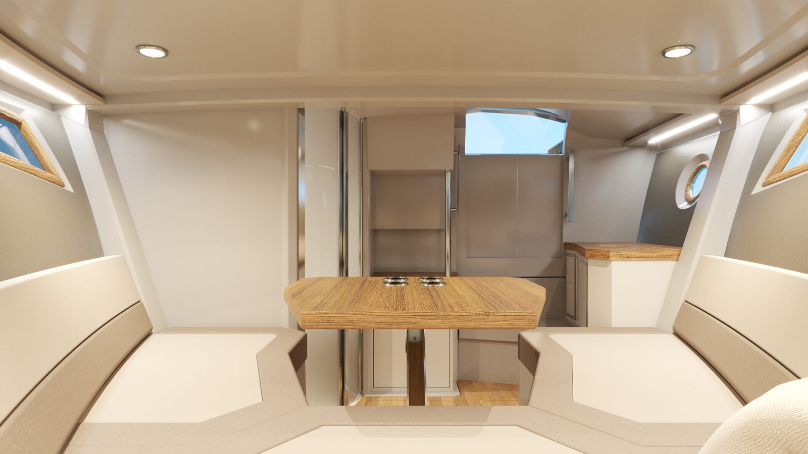 Udoben interier jahte s sedežno garnituro, jedilno mizo in vgrajenimi shranjevalnimi prostori