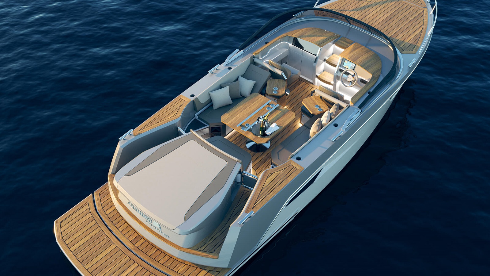 Zgornji pogled na motorni čoln z oblazinjenimi sedeži, jedilno mizo in ležiščem za sončenje