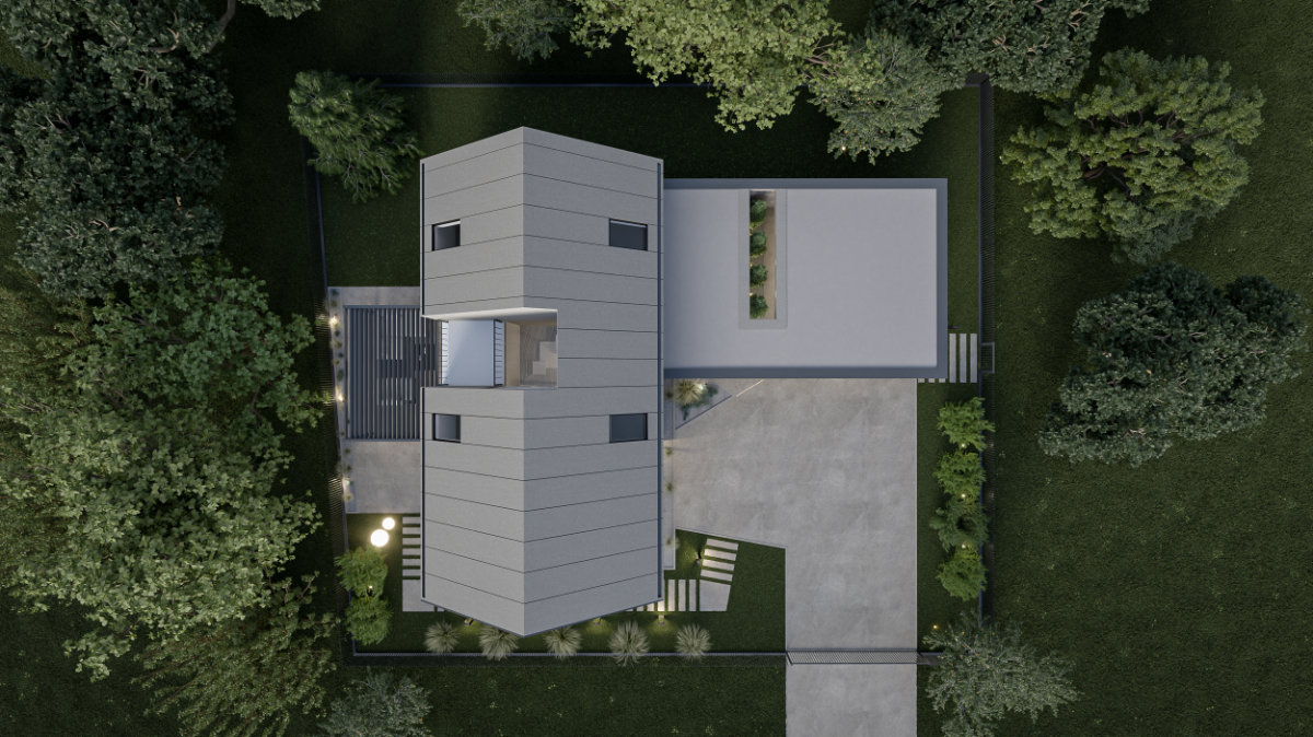 Bird's eye view of a modern house with a gable roof in nature